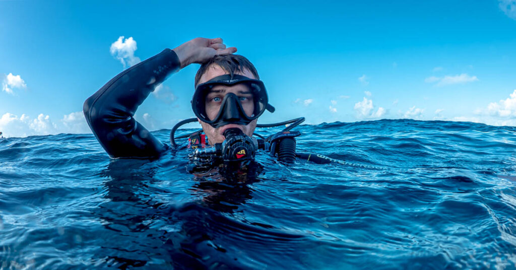 Scuba diver underwater representing medical clearance for diving