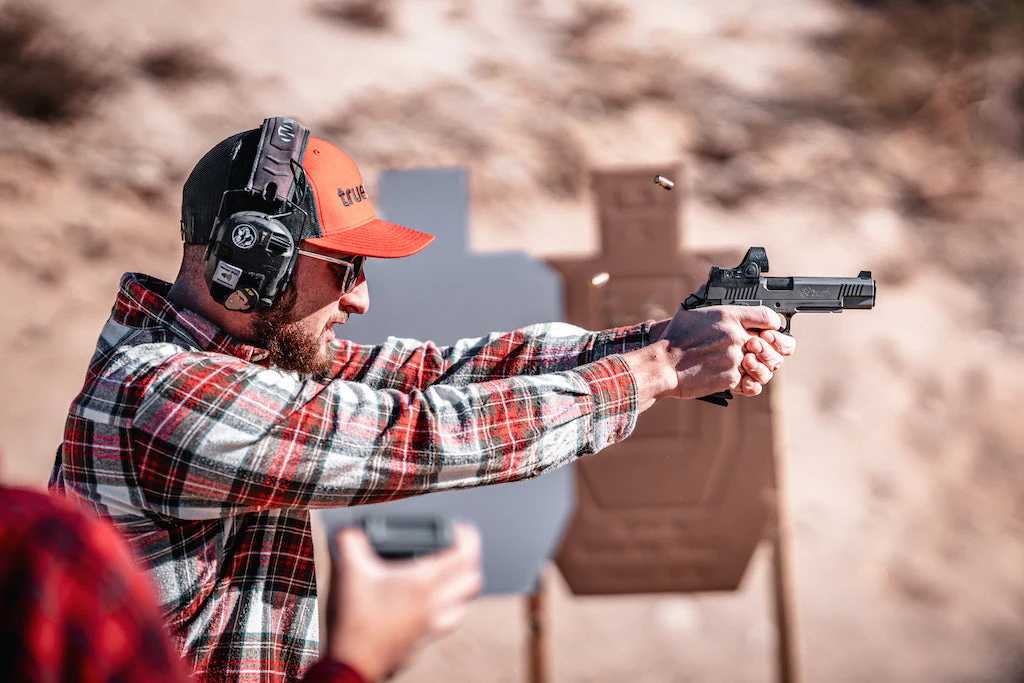 Shotgun licence medical consultation UK with doctor reviewing medical records