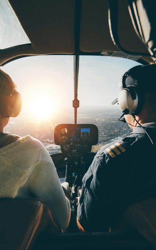 pilots-flying-a-helicopter-on-sunny-day